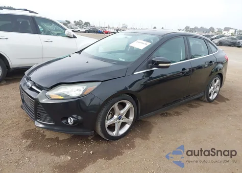 2014 Ford Focus Titanium from USA, damaged, VIN 1FADP3J27EL374518